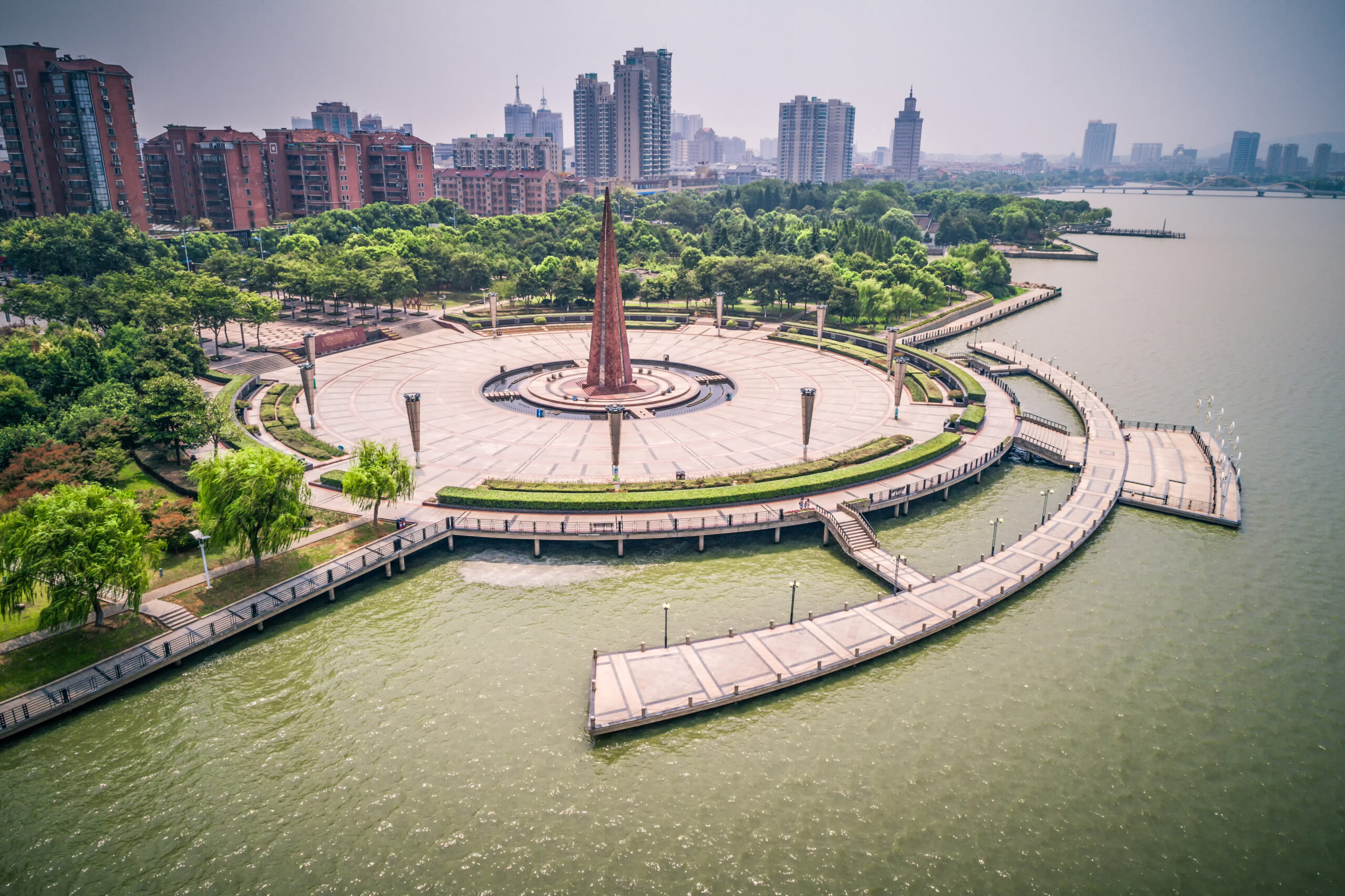 Empty square and lake in the city park